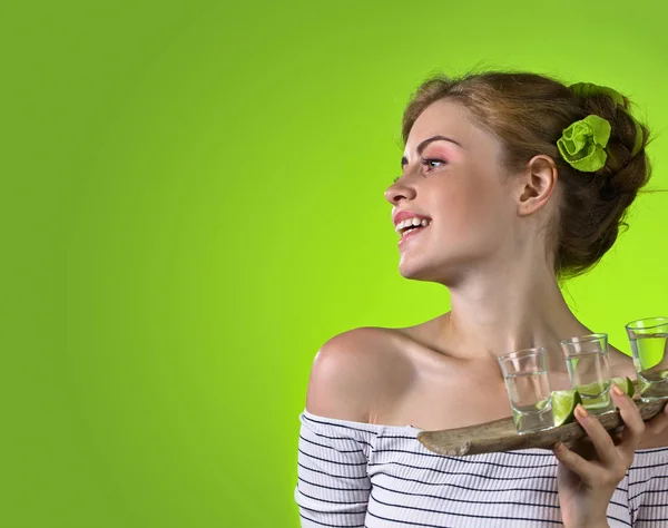 Beautiful woman with glasses of tequila . — Stock Photo, Image