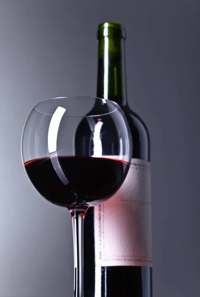 Bottle and glass of red wine . — Stock Photo, Image