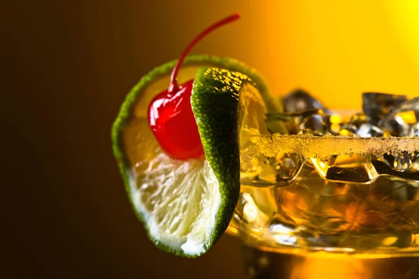Cocktail with cherry and lime. — Stock Photo, Image