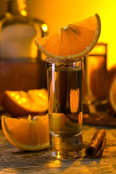 Tequila with orange and cinnamon . — Stock Photo, Image