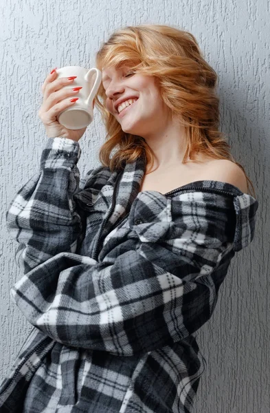 Pretty blonde with white mug . — Stock Photo, Image