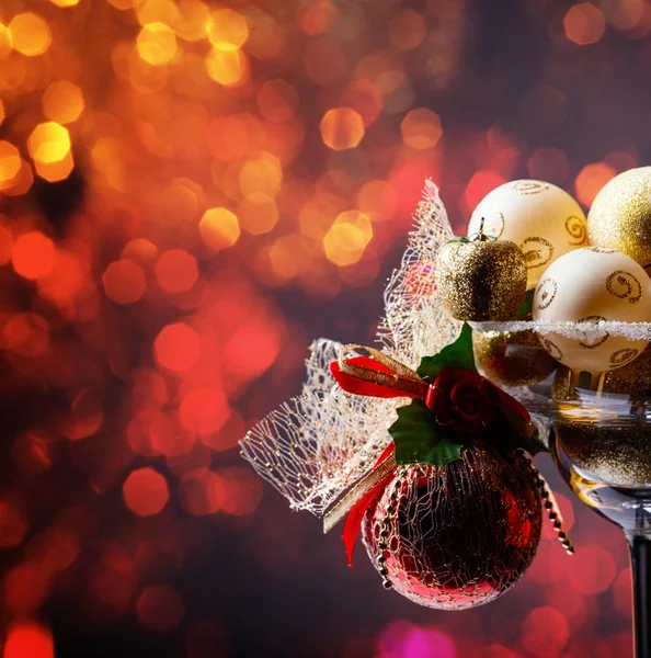 Christmas balls in wineglass . — Stock Photo, Image