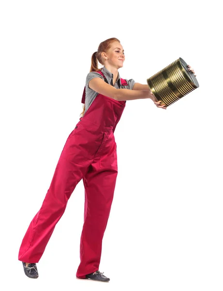 Young woman in a red jumpsuit with bucket . — Stock Photo, Image