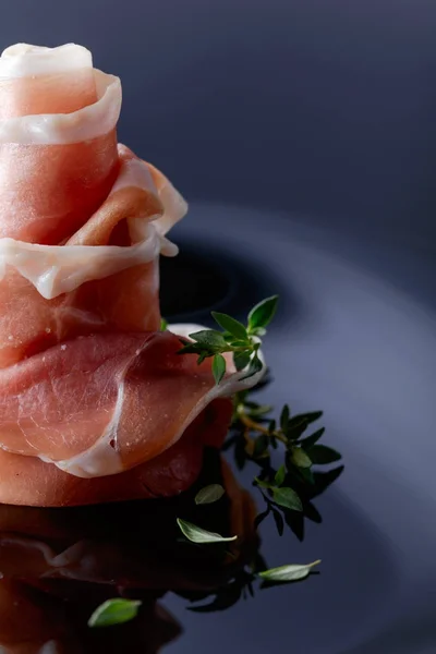Prosciutto with thyme. — Stock Photo, Image