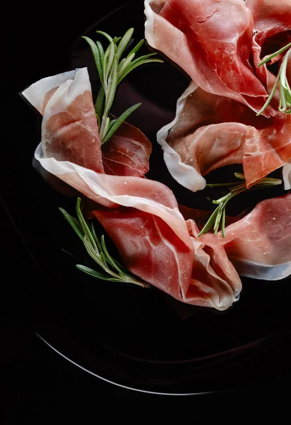 Prosciutto rozmaringgal. — Stock Fotó