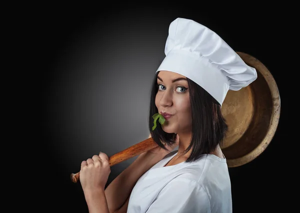 Jovem mulher em uniforme de chef . — Fotografia de Stock