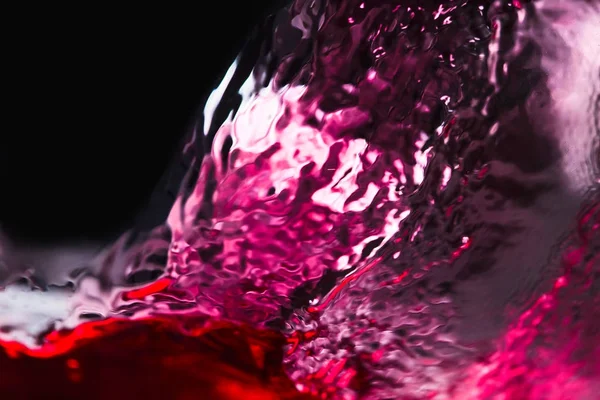 Red wine on black background Royalty Free Stock Photos