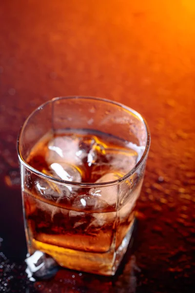 Glass of scotch whiskey with natural ice . — Stock Photo, Image