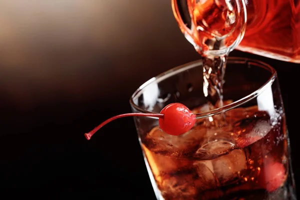 Cocktail Manhattan with cherry. — Stock Photo, Image