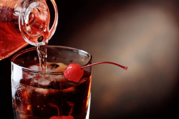 Cocktail Manhattan with cherry. — Stock Photo, Image