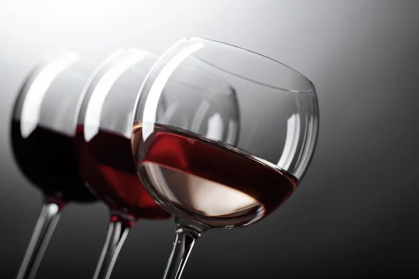 Glasses of  pink , red and white wine . — Stock Photo, Image