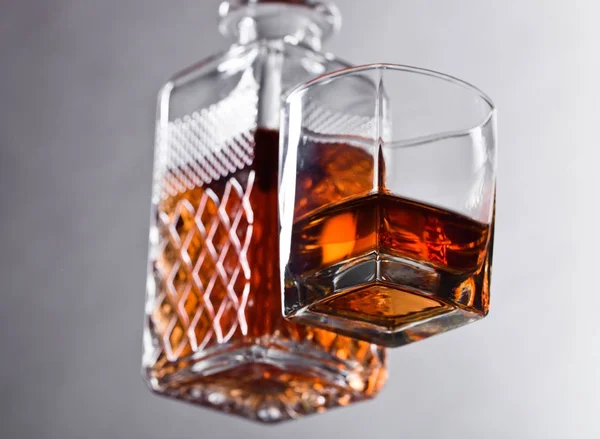 Whiskey on a glass table in bar. — Stock Photo, Image