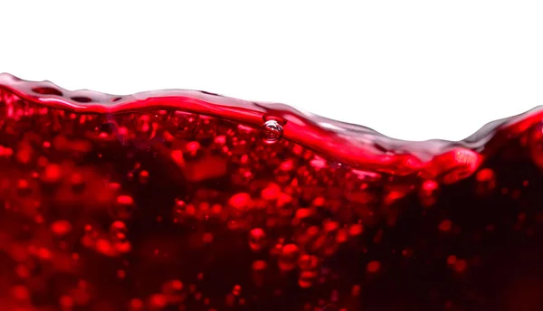 Salpicaduras abstractas de vino tinto sobre fondo blanco . —  Fotos de Stock