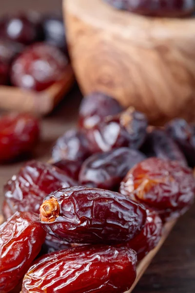 Juicy dates on wooden table . — Stock Photo, Image