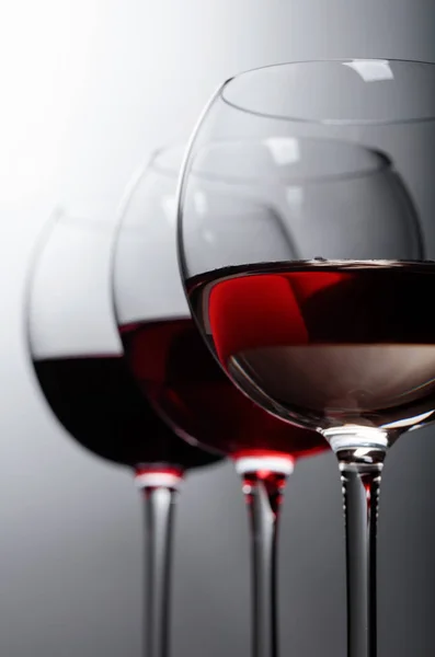 Glasses of  pink , red and white wine . — Stock Photo, Image