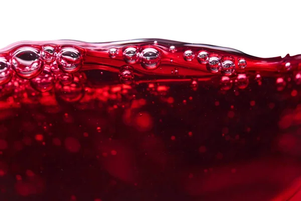 Rotwein auf weißem Hintergrund. — Stockfoto