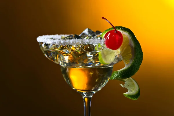 Alcoholic cocktail with cherry and lime. — Stock Photo, Image