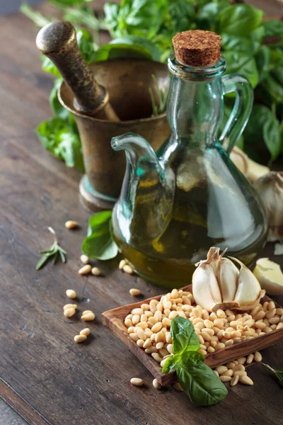 Ingredients for making pesto on a wooden table . — Stock Photo, Image