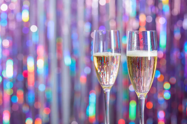 Champagne glasses on lights background. Christmas and New Year h — ストック写真