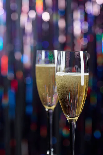 Champagne glasses on lights background. Christmas and New Year h — ストック写真