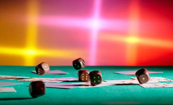Wooden dice on casino table in move . — Stock Photo, Image