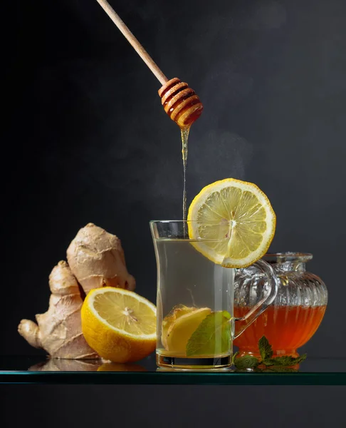 Ginger tea with lemon, mint and honey. — Stock Photo, Image