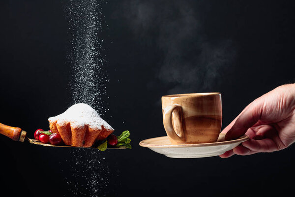 Muffin with cranberries and mint sprinkled with sugar powder.  M