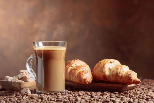 Coffee with cream and croissants. — Stock Photo, Image