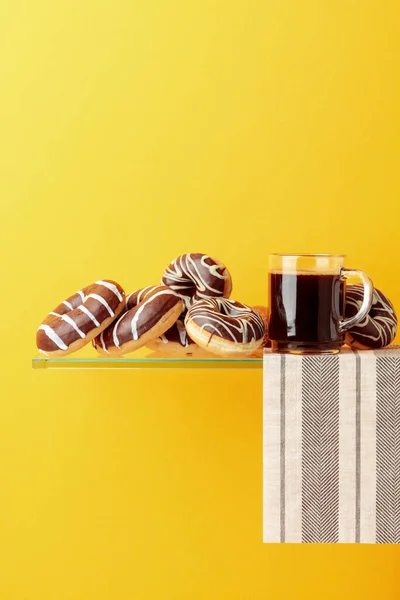 Chocolate donuts and black coffee. — Stock Photo, Image