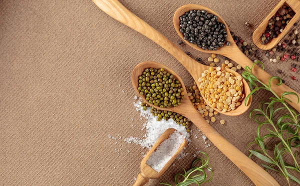 Various Raw Lentils Rosemary Salt Pepper Top View Copy Space — Stock Photo, Image