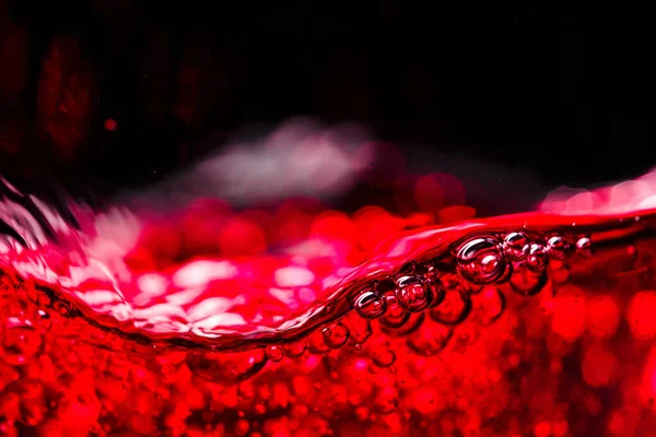 Siyah Arka Planda Kırmızı Şarap Soyut Sıçrama — Stok fotoğraf