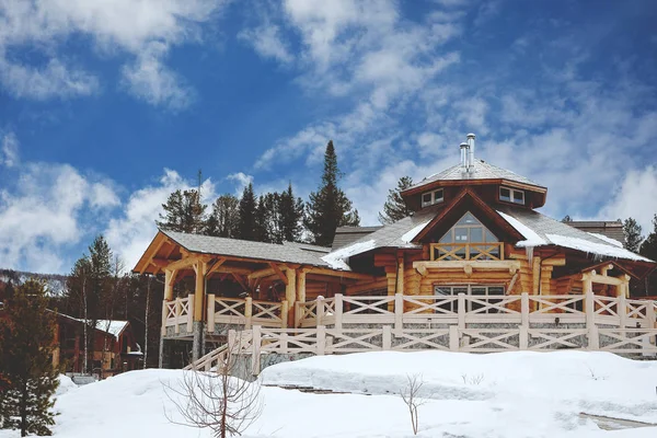 Log house in the winter in the mountains — Stock Photo, Image