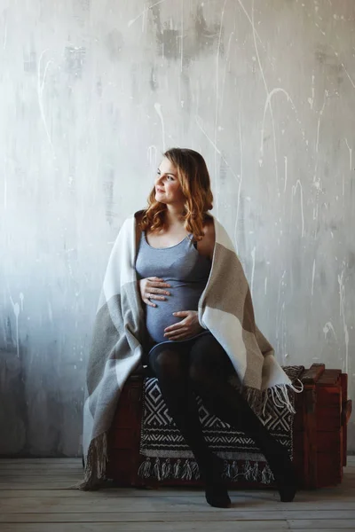 Happy pregnant woman in studio. — Stock Photo, Image