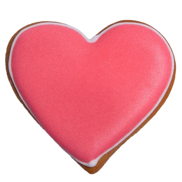 Pain d'épice rouge comme coeur avec glaçure colorée sur gros plan isolé — Photo