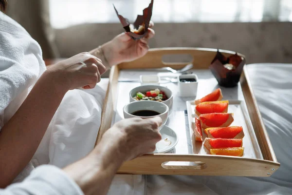 Tray with breakfast in bed.