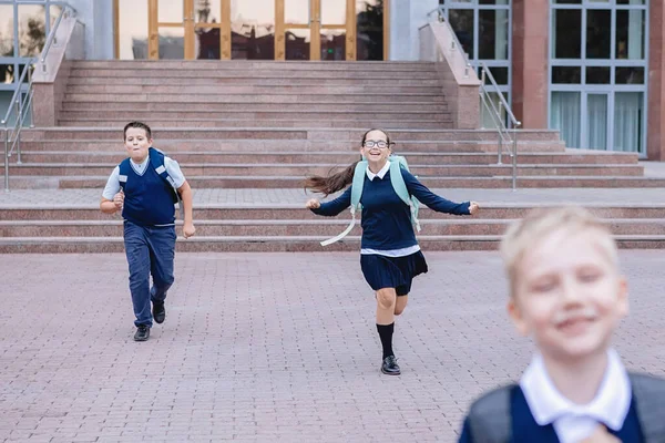 Pupils Uniform Run Out School Stairs — Foto de Stock