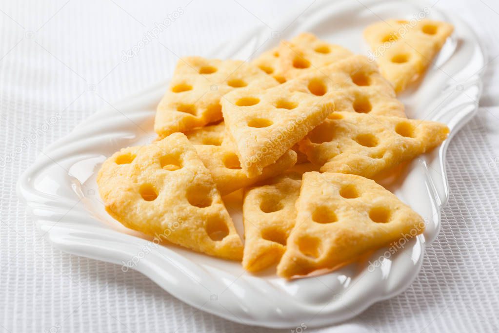 Cheese crackers on white
