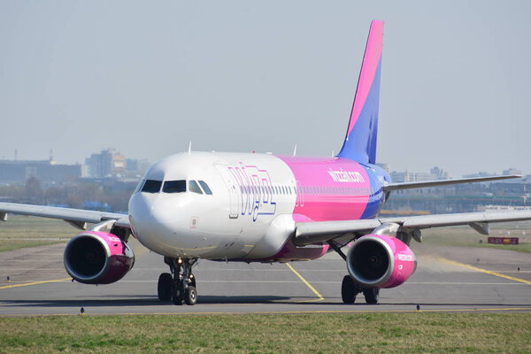 This is a view of WizzAir plane Airbus A320-232 registered as HA-LWC on the Warsaw Chopin Airport. April 1, 2017. Warsaw, Poland.