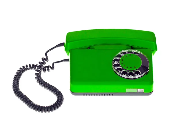 Vieux téléphone vert sur fond blanc. — Photo