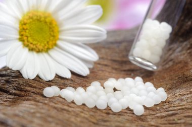 homeopathic globules as therapy for alternative medicine clipart