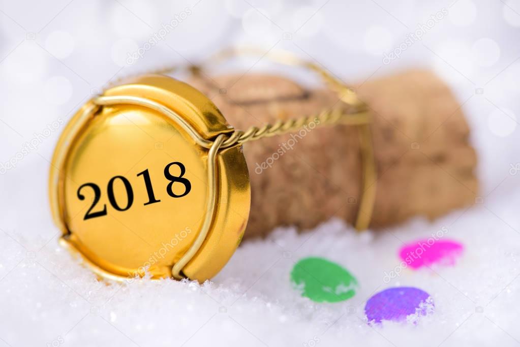 cork of champagne printed with new years date 2018