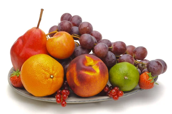 Plate with mixed fruits over white background — Stock Photo, Image