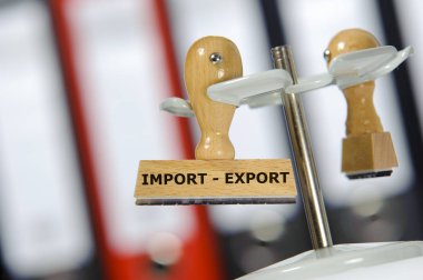  import - export printed on rubber stamp in office clipart