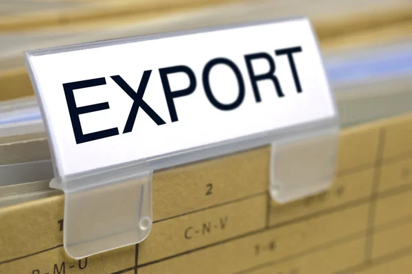 Import - exportación impresa en la parte superior de la carpeta de archivos con documentos dentro — Foto de Stock