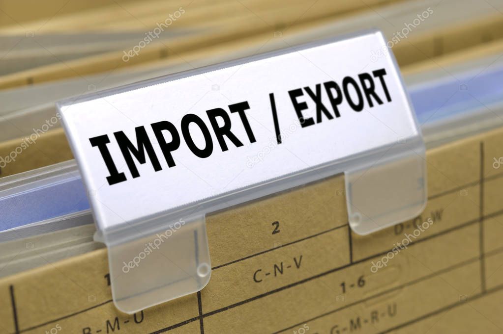  import - export printed on top of file folder with documents inside