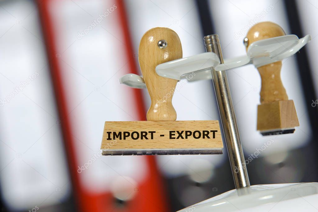  import - export printed on rubber stamp in office