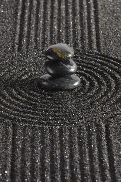 Japanese Zen garden of tranquility with stone in textured sand — Stock Photo, Image