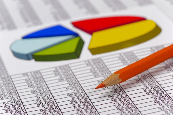 Pencil laying on financial business chart — Stock Photo, Image