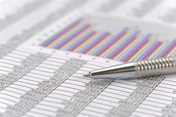 Pencil laying on financial business chart — Stock Photo, Image