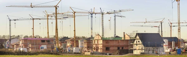 Panoramic view to construction site of new build residential hou — Stock Photo, Image